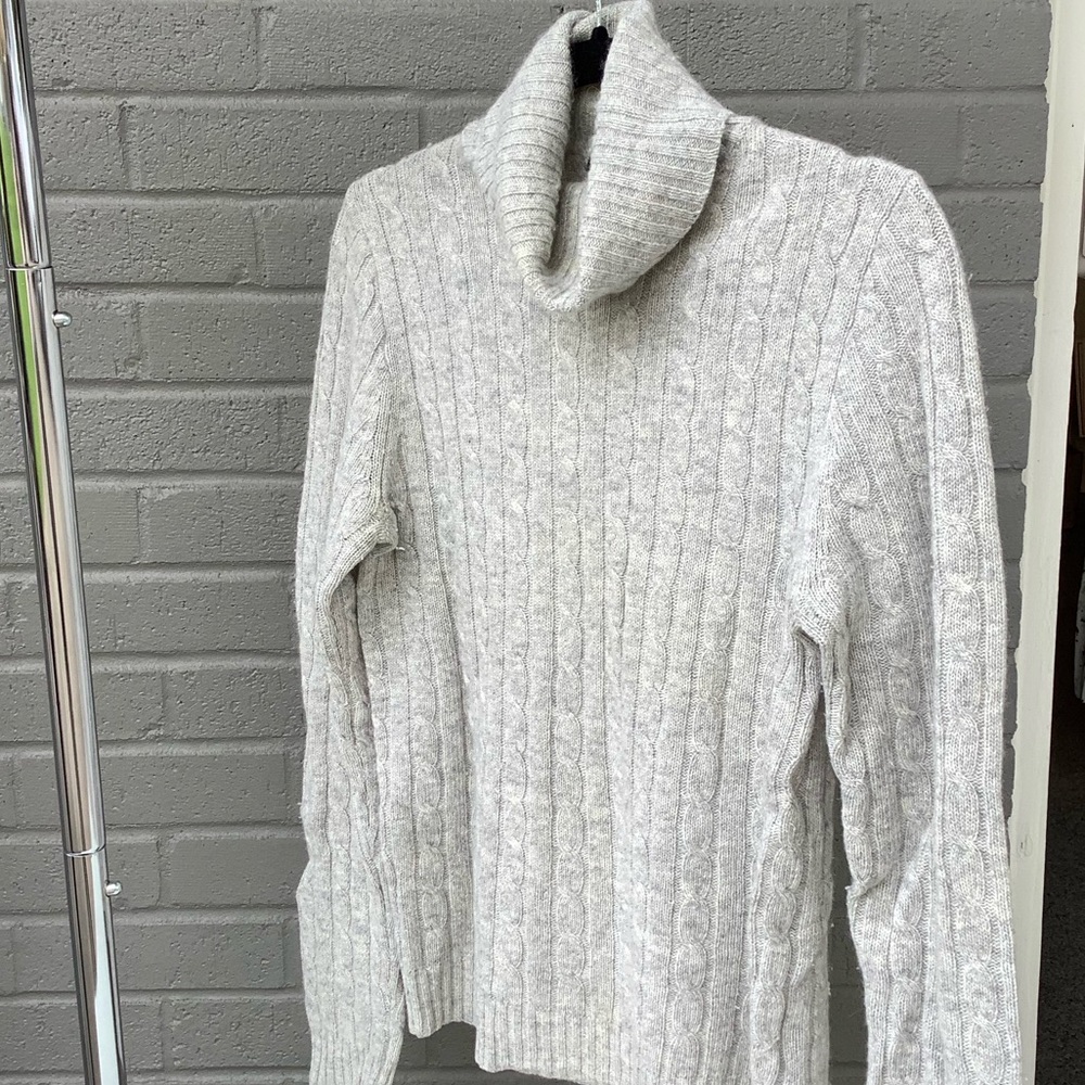 Gray cable knit turtleneck sweater